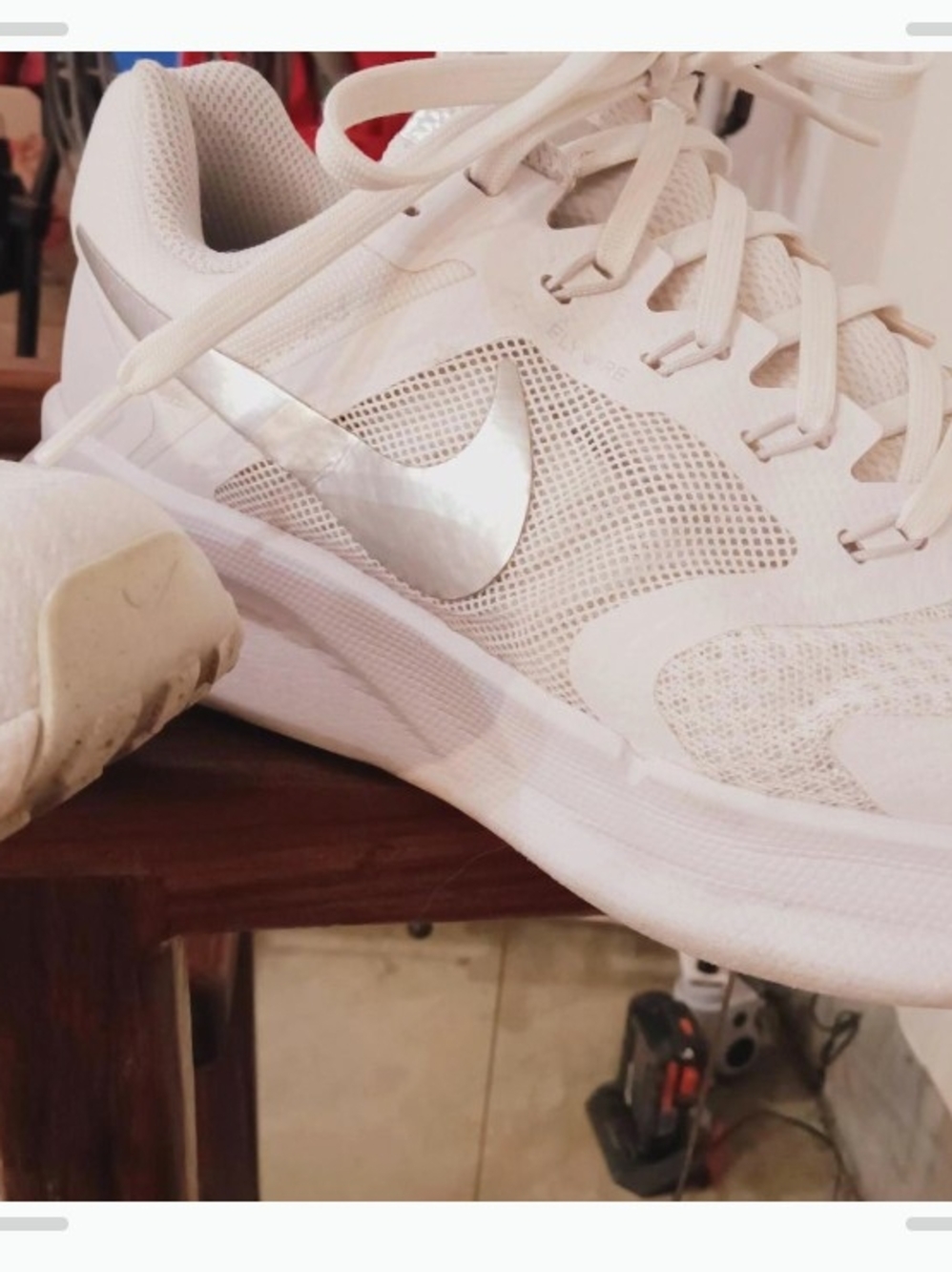 Nike Women's White Athletic Sneakers with Silver Swoosh